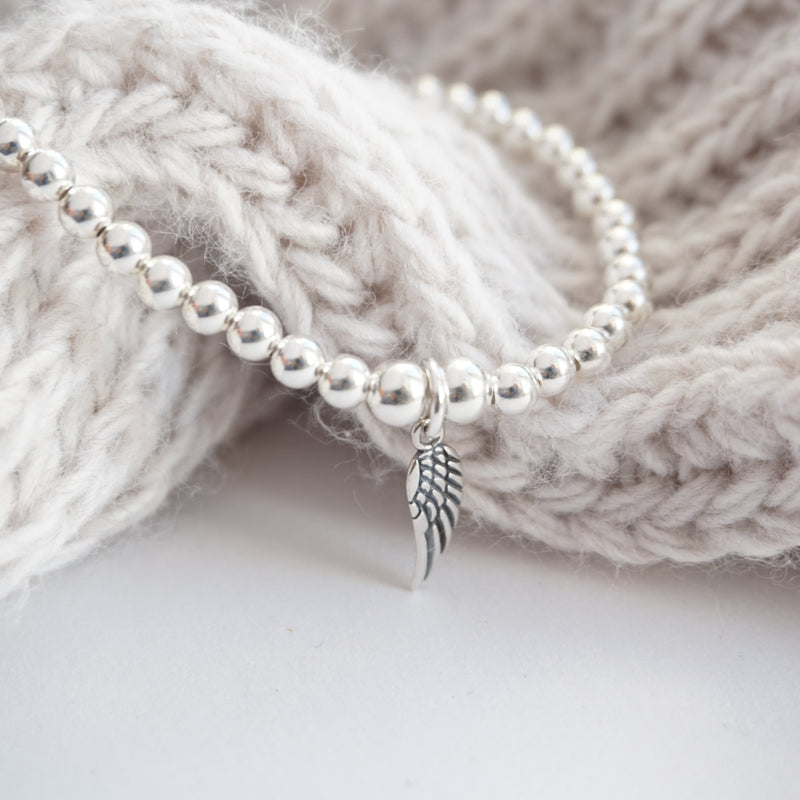 Sterling Silver Stretch Bracelet With Angel Wing Charm
