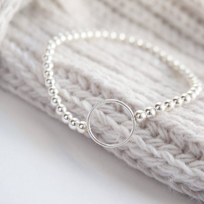 Sterling Silver Stretch Bracelet With Karma Circle