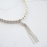 Sterling Silver Stretch Bracelet With Tassel Charm