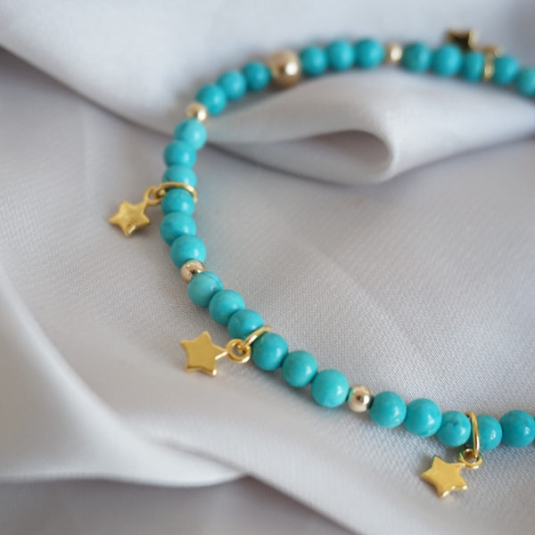 Gold and Turquoise Bracelet With Stars