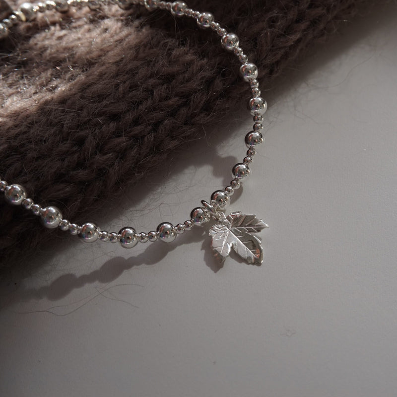 Sterling Silver Stretch Bracelet With Leaf Charm